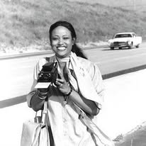 Young Gloria Gifford with camera